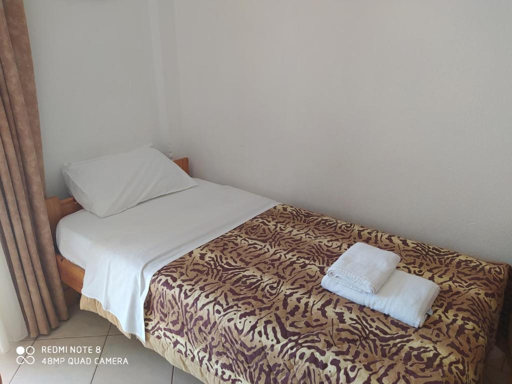 Postel nebo postele na pokoji v ubytování Hause Zorbas