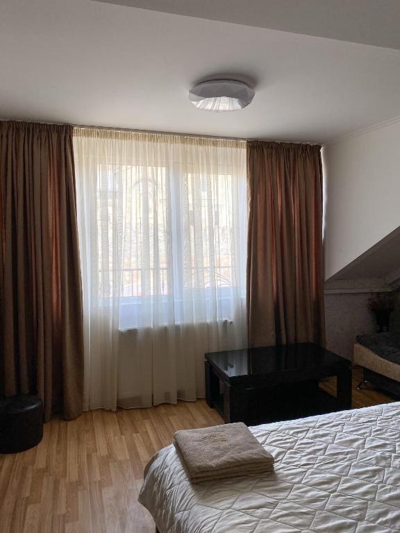 Postel nebo postele na pokoji v ubytování Guest House IBERIA