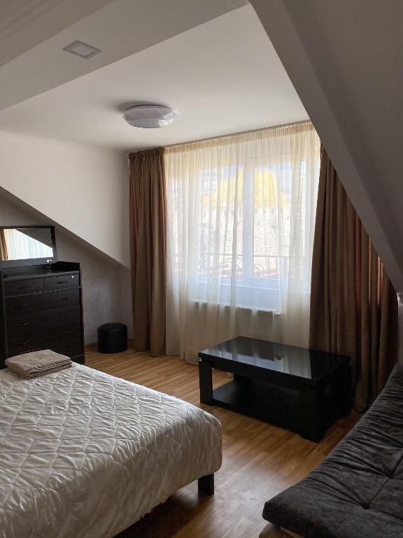 Postel nebo postele na pokoji v ubytování Guest House IBERIA