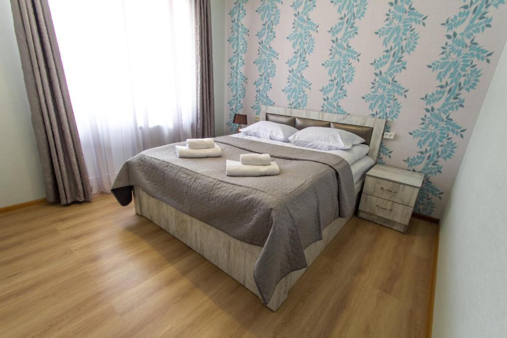 Postel nebo postele na pokoji v ubytování Katos Guesthouse Mestia