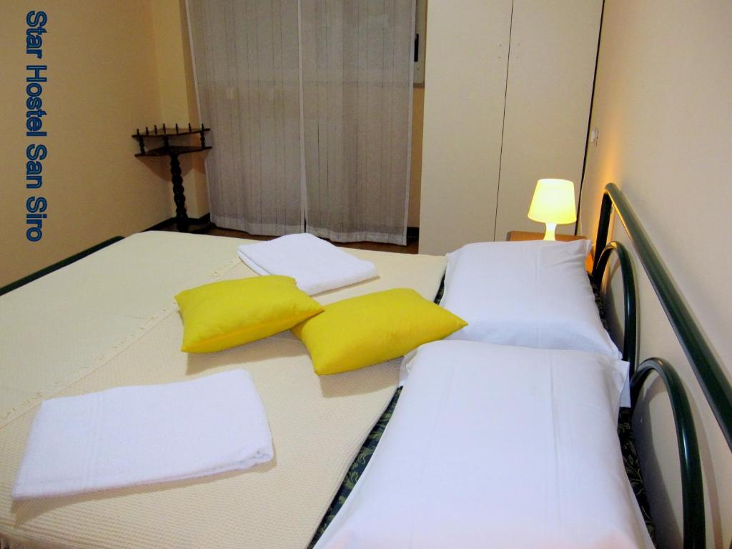 Postel nebo postele na pokoji v ubytování Star Hostel San Siro Fiera
