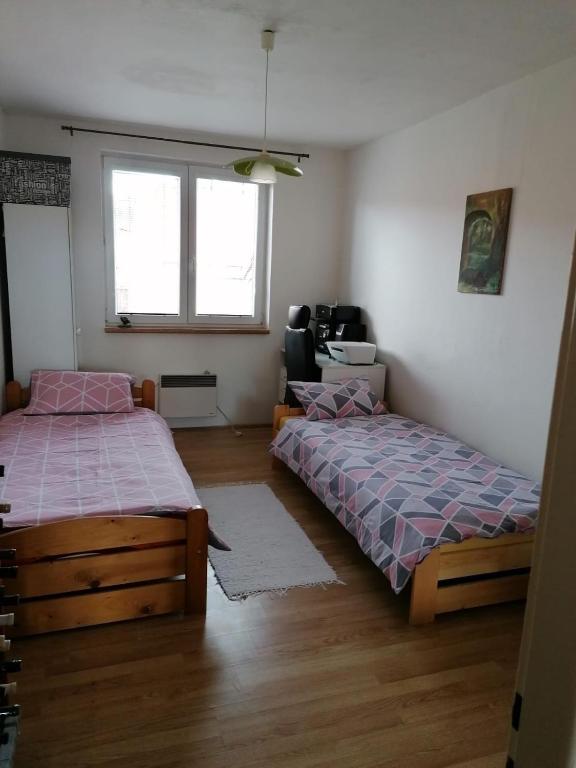 Postel nebo postele na pokoji v ubytování Ubytování v soukromí