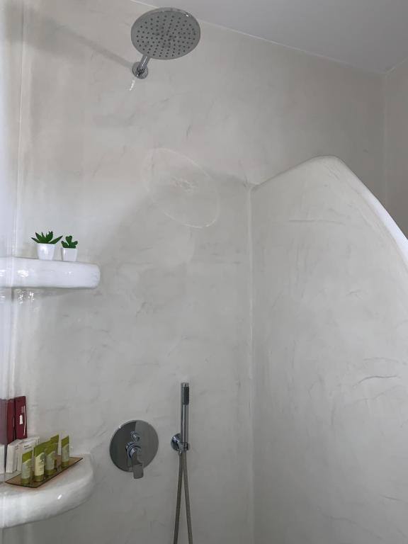 Koupelna v ubytování Sun Stories Suites