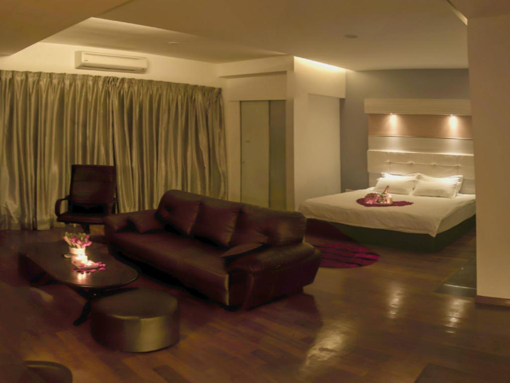 Postel nebo postele na pokoji v ubytování Avantgarde Hotel