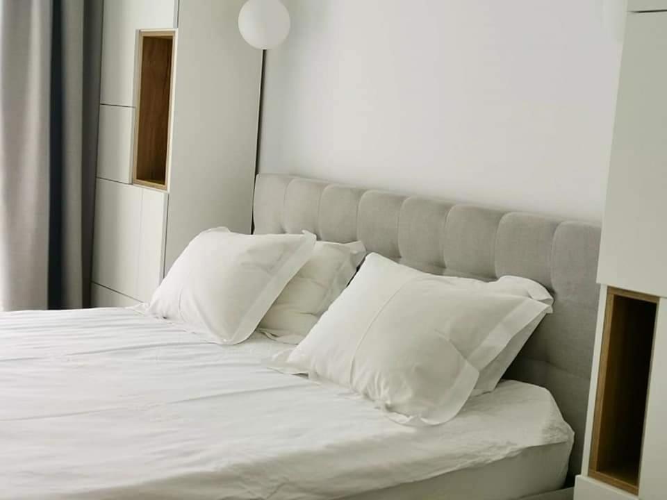 Ένα ή περισσότερα κρεβάτια σε δωμάτιο στο 49 Apartment