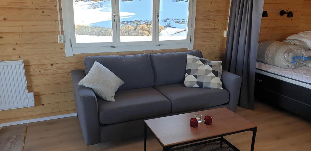 Posezení v ubytování Hvammur 4 with private hot tub (Fagurgali)