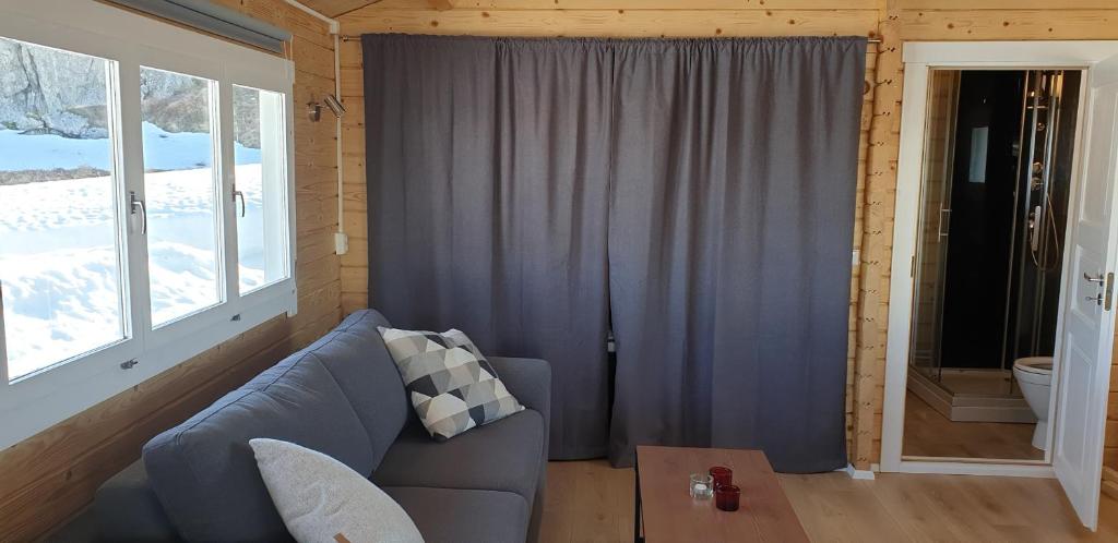 Posezení v ubytování Hvammur 4 with private hot tub (Fagurgali)