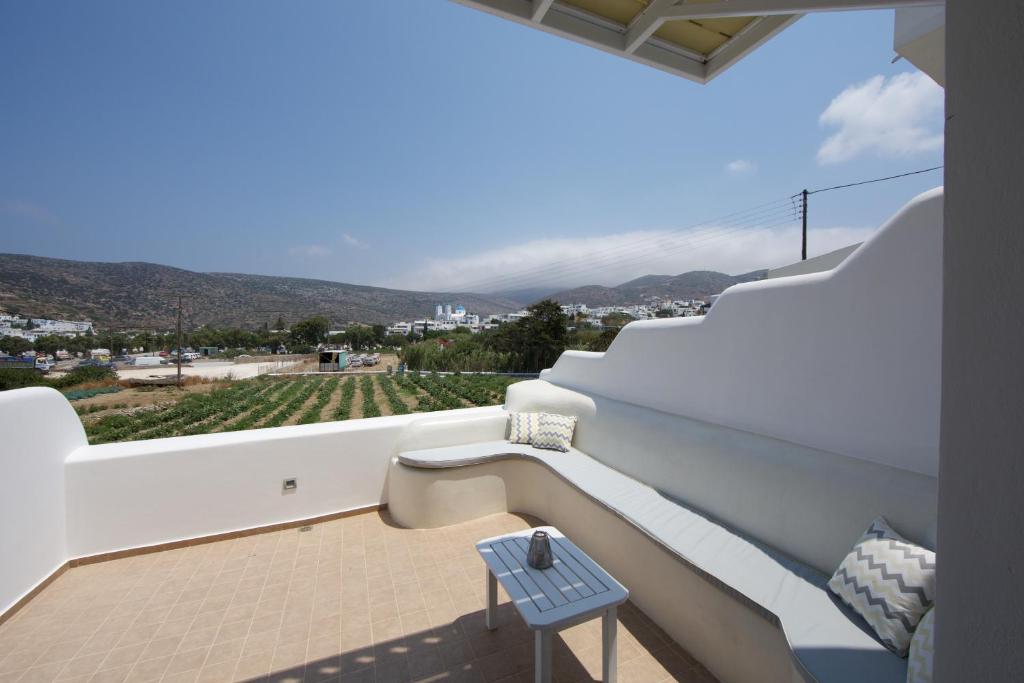 a view from the balcony of a house at Diasino Apartments and Car Rental in Katapola