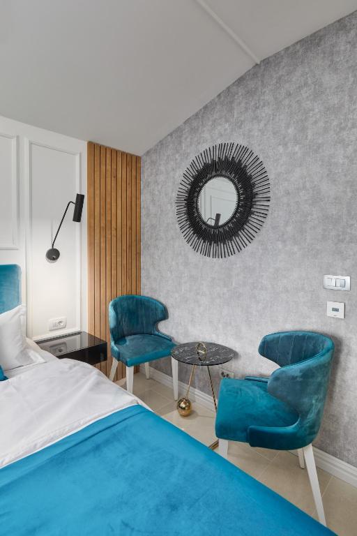 Postel nebo postele na pokoji v ubytování Kotor Lux apartments and rooms