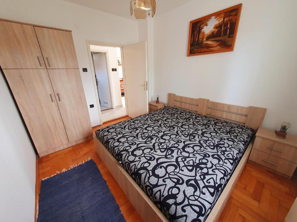 Postel nebo postele na pokoji v ubytování Szekrény Apartman