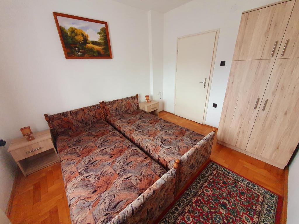 Postel nebo postele na pokoji v ubytování Szekrény Apartman