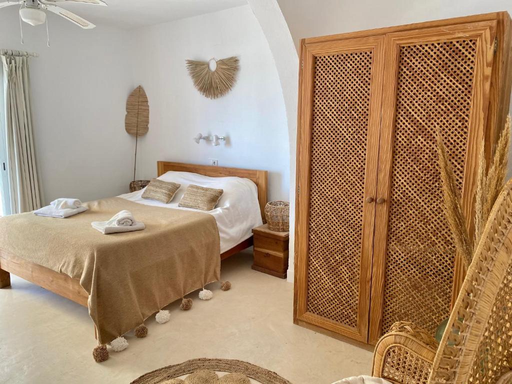 Postel nebo postele na pokoji v ubytování La Bohemia del Rio Boutique Hotel - Adults Only
