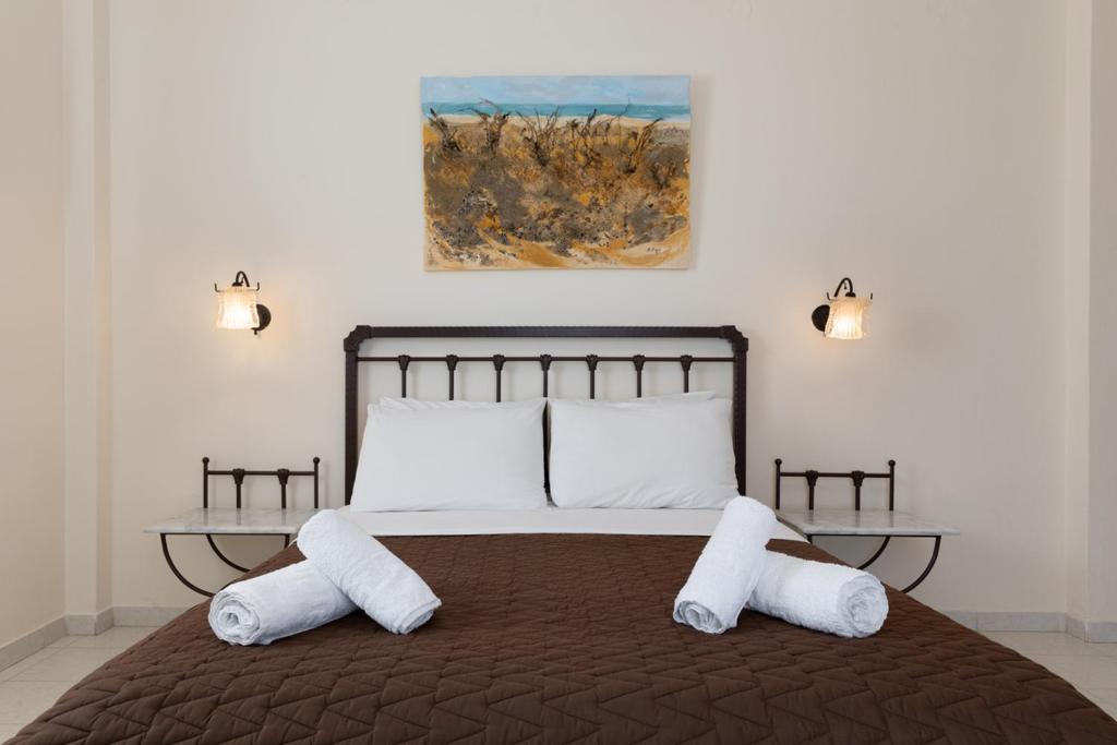 Postel nebo postele na pokoji v ubytování Sardis Rooms