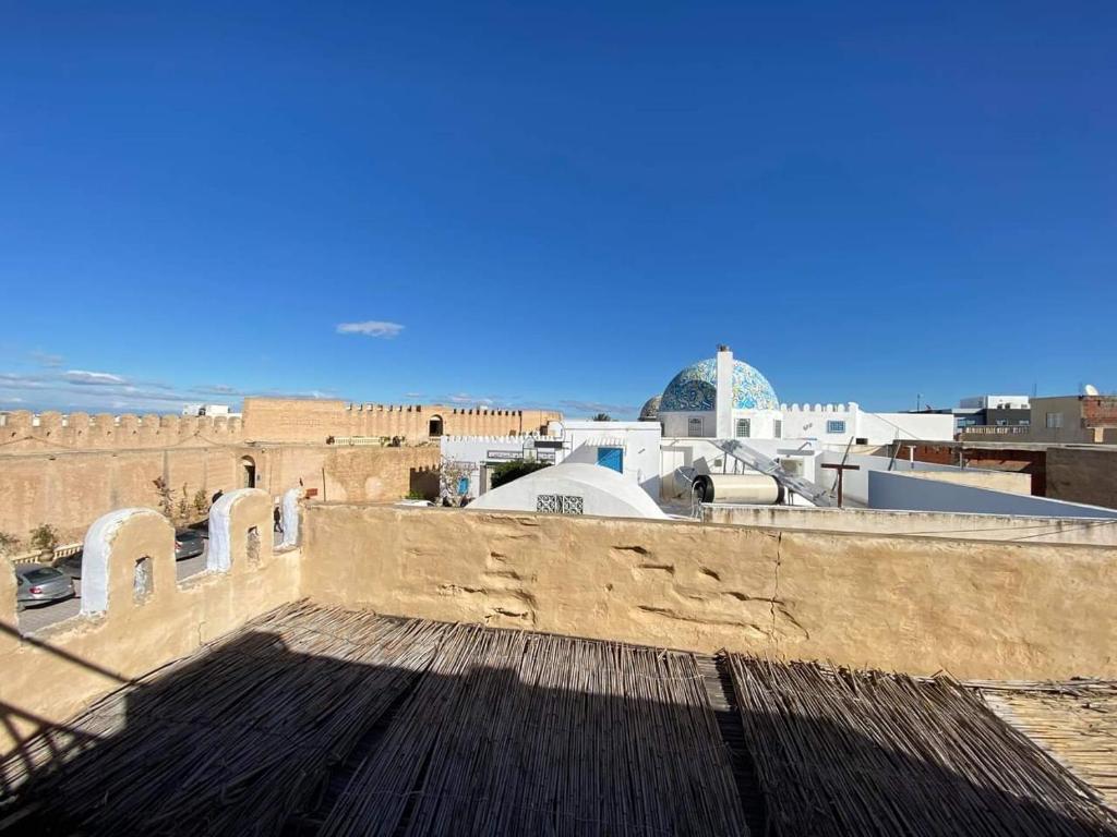 a view of a city from the roof of a building at Maison d'hôte Chama in Kairouan