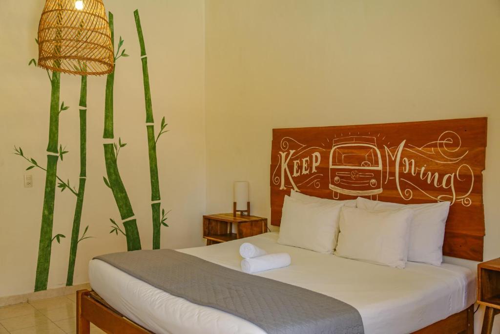 Postel nebo postele na pokoji v ubytování Hotel Sur Bacalar