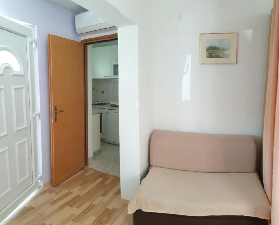 Kuchyň nebo kuchyňský kout v ubytování Apartments Andelic