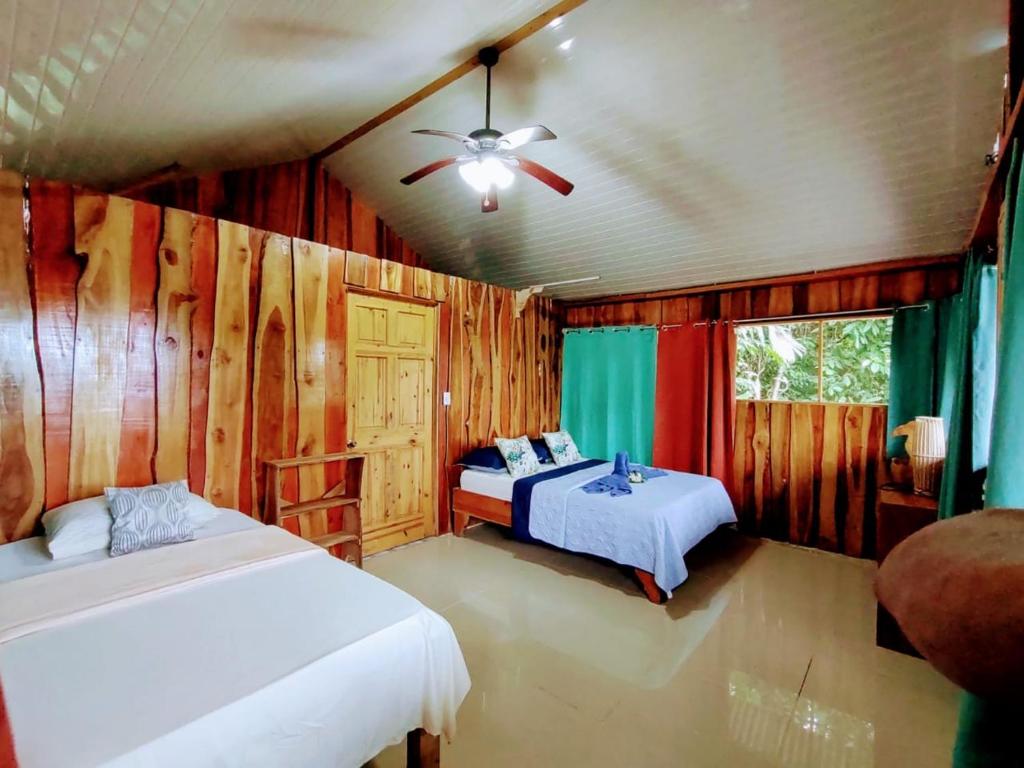 Кровать или кровати в номере The Sunset Tucano Lodge
