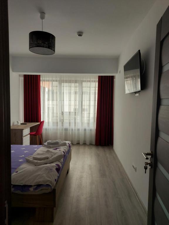 מיטה או מיטות בחדר ב-BYA Luxury