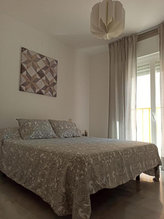 Posteľ alebo postele v izbe v ubytovaní Apartamento la Noria 2 Playa