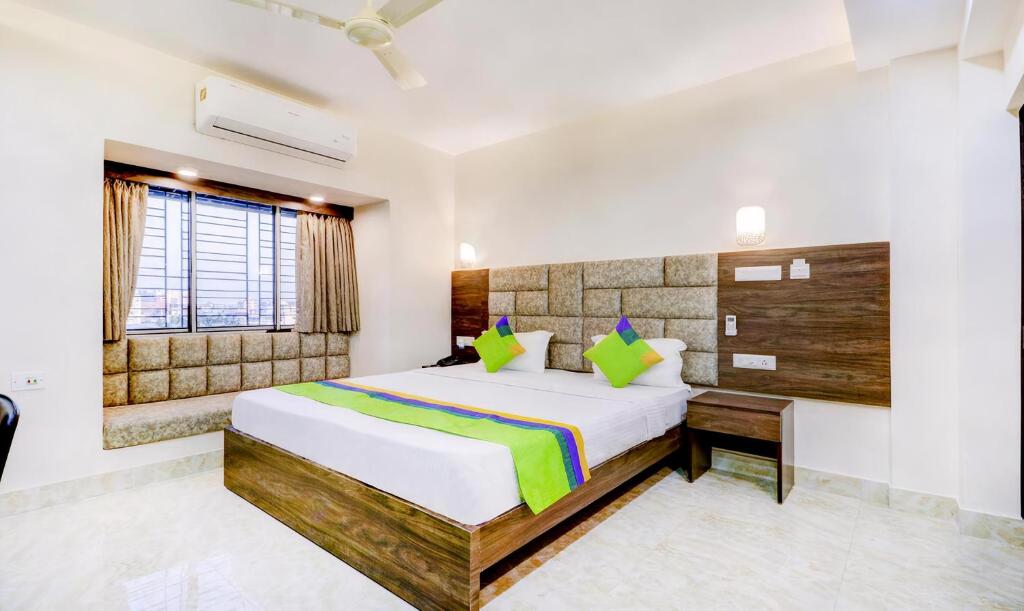 Postel nebo postele na pokoji v ubytování Hotel Bandhan Residency