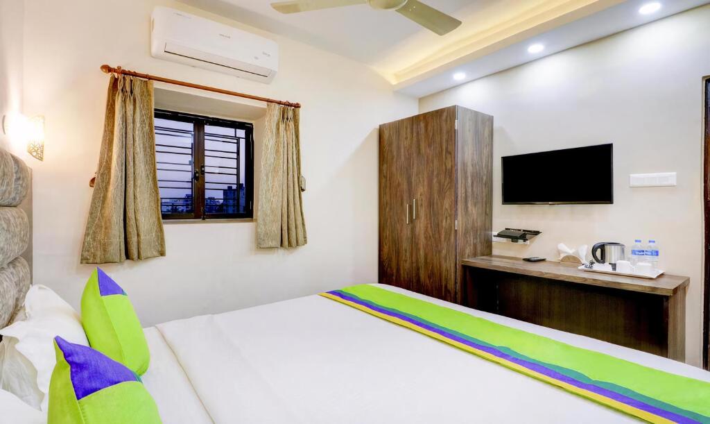 Postel nebo postele na pokoji v ubytování Hotel Bandhan Residency