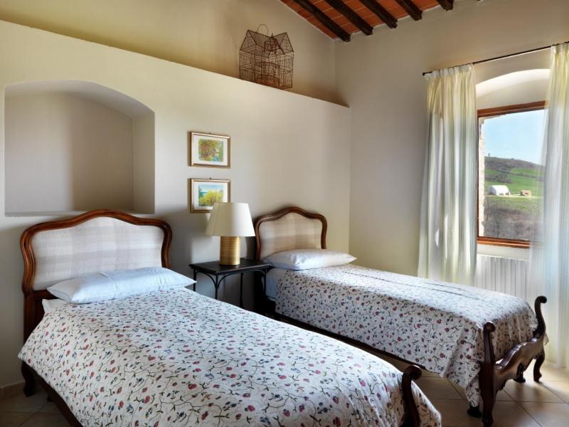 A bed or beds in a room at Agriturismo Piettorri