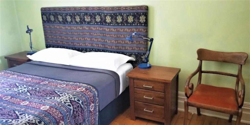 Postel nebo postele na pokoji v ubytování Northern Arts Hotel