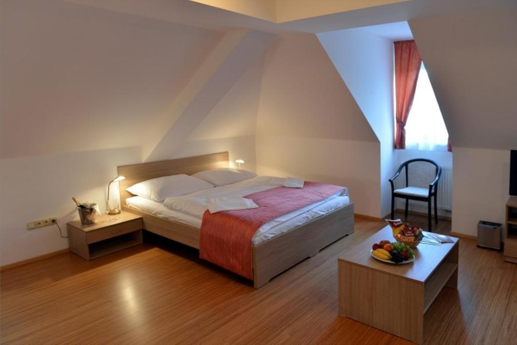 Postel nebo postele na pokoji v ubytování Resort Johanka