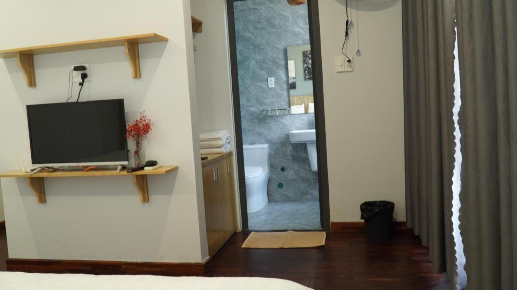 TV a/nebo společenská místnost v ubytování 5 Elements Hotel