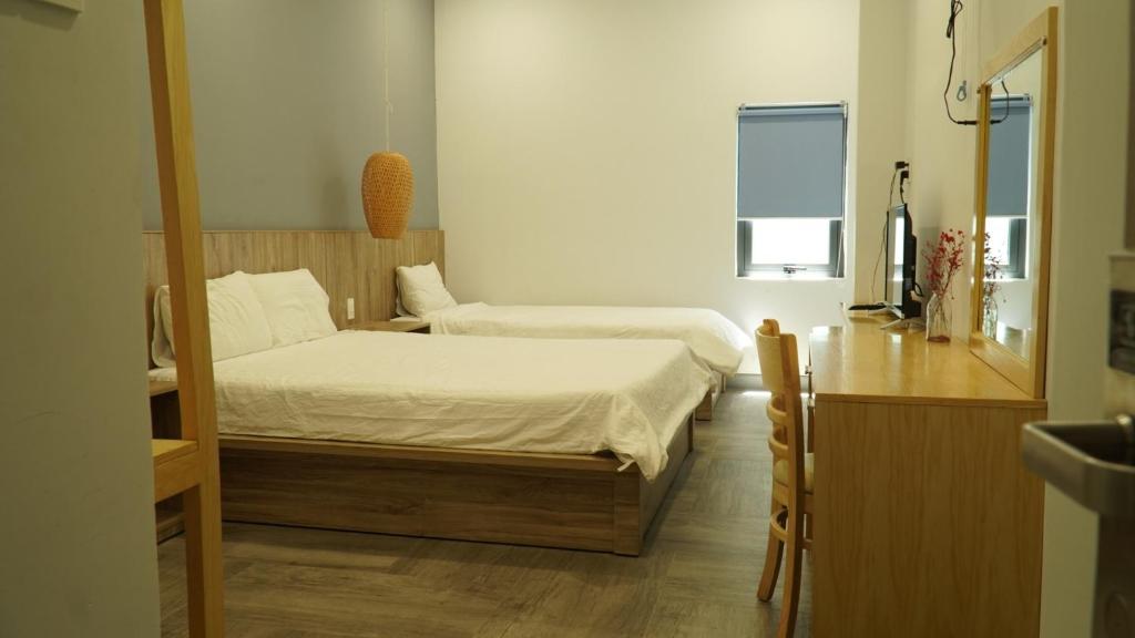 Postel nebo postele na pokoji v ubytování 5 Elements Hotel