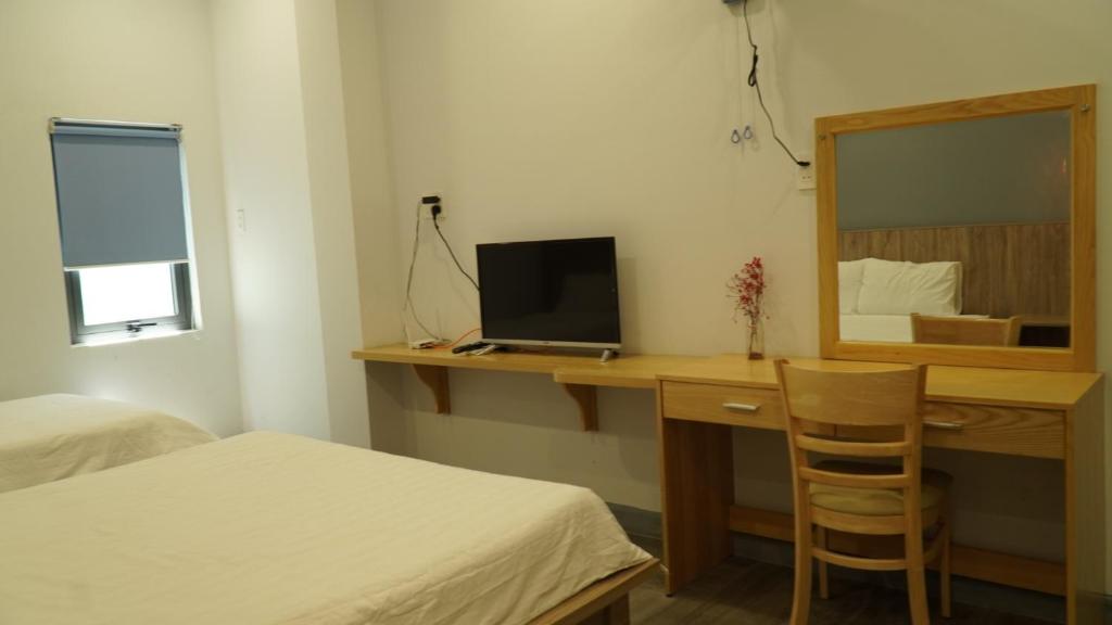 Postel nebo postele na pokoji v ubytování 5 Elements Hotel