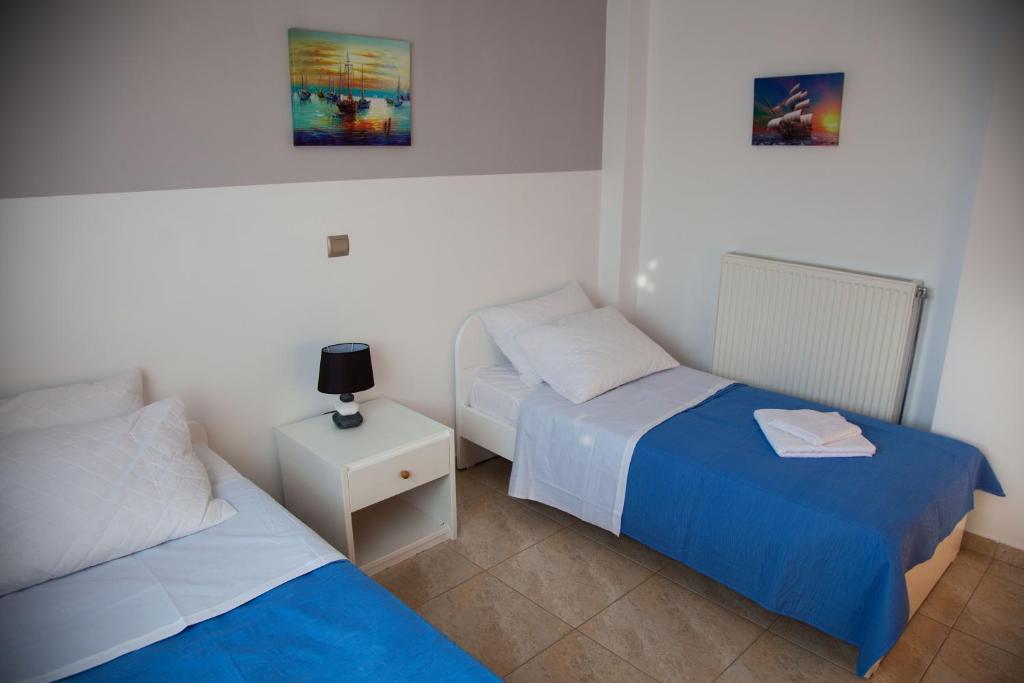 Postel nebo postele na pokoji v ubytování Villa Mary