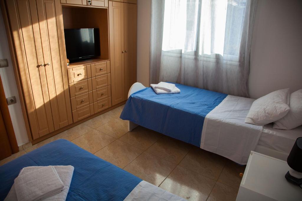 Postel nebo postele na pokoji v ubytování Villa Mary