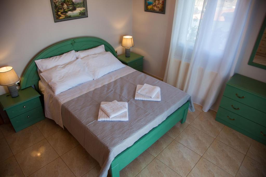Postel nebo postele na pokoji v ubytování Villa Mary