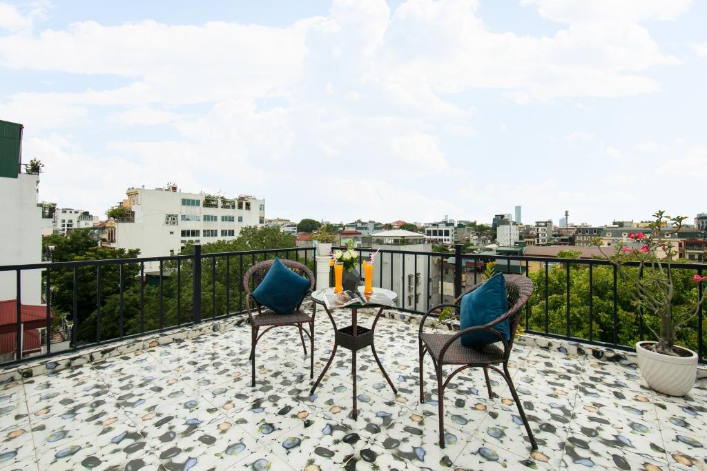 Balkón nebo terasa v ubytování Golden Rooster Hotel