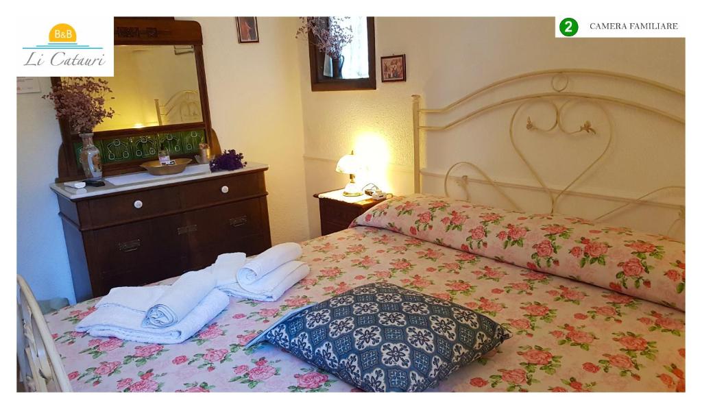 A bed or beds in a room at Li Catauri
