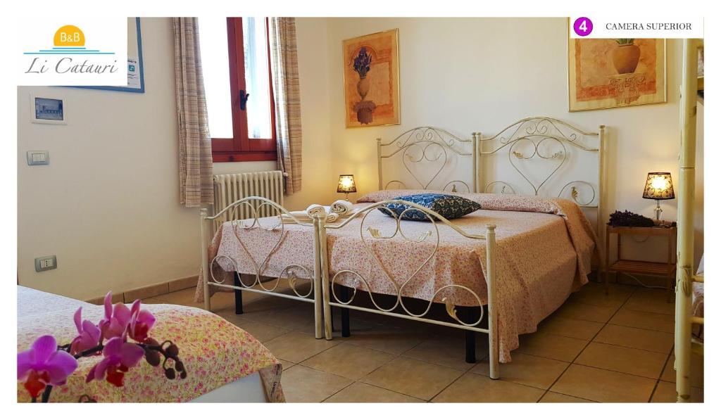 A bed or beds in a room at Li Catauri