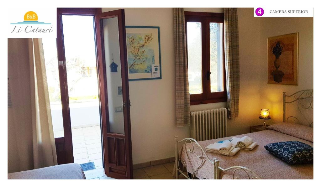 A bed or beds in a room at Li Catauri