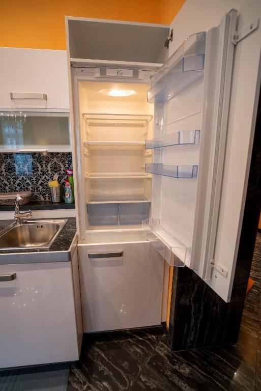 Kuchyň nebo kuchyňský kout v ubytování Apartment Comfort