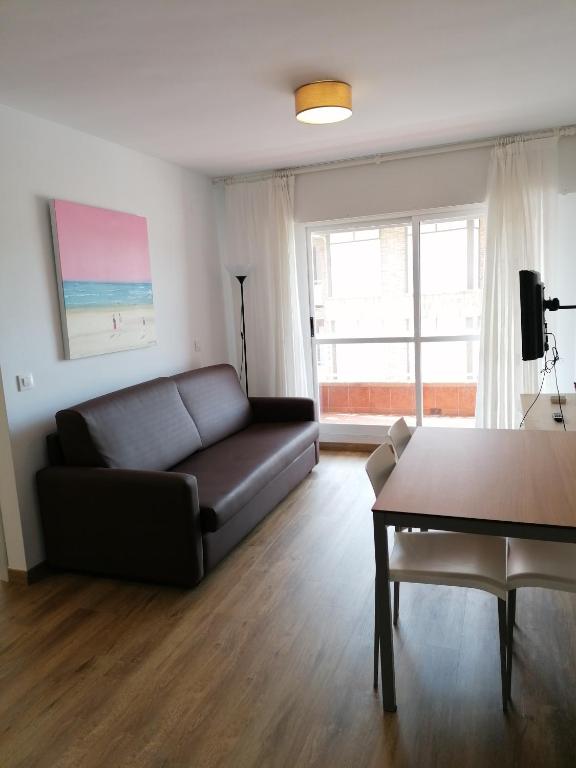 Posedenie v ubytovaní Apartamentos Regollera