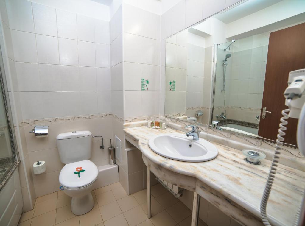 Koupelna v ubytování Hotel Saturn