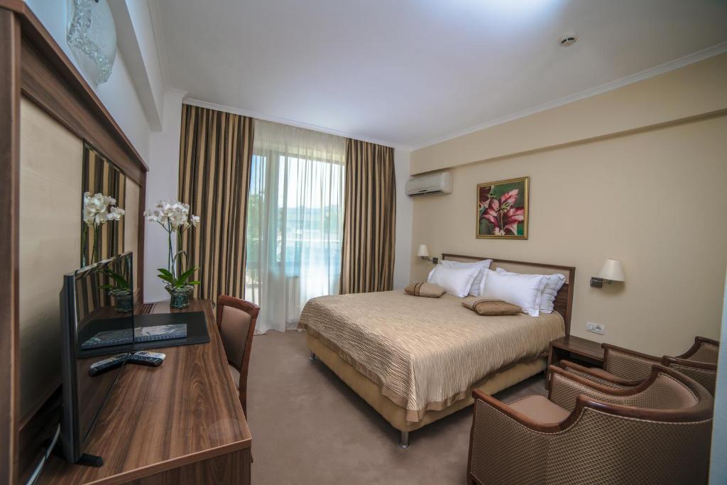 TV a/nebo společenská místnost v ubytování Hotel Saturn