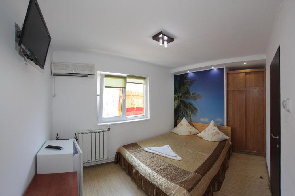 Postel nebo postele na pokoji v ubytování Casa Francisc