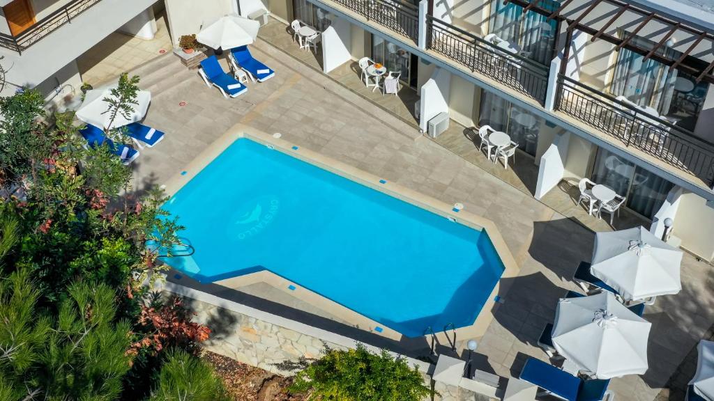 an overhead view of a swimming pool in a building at Crystallo Apartments in Paphos