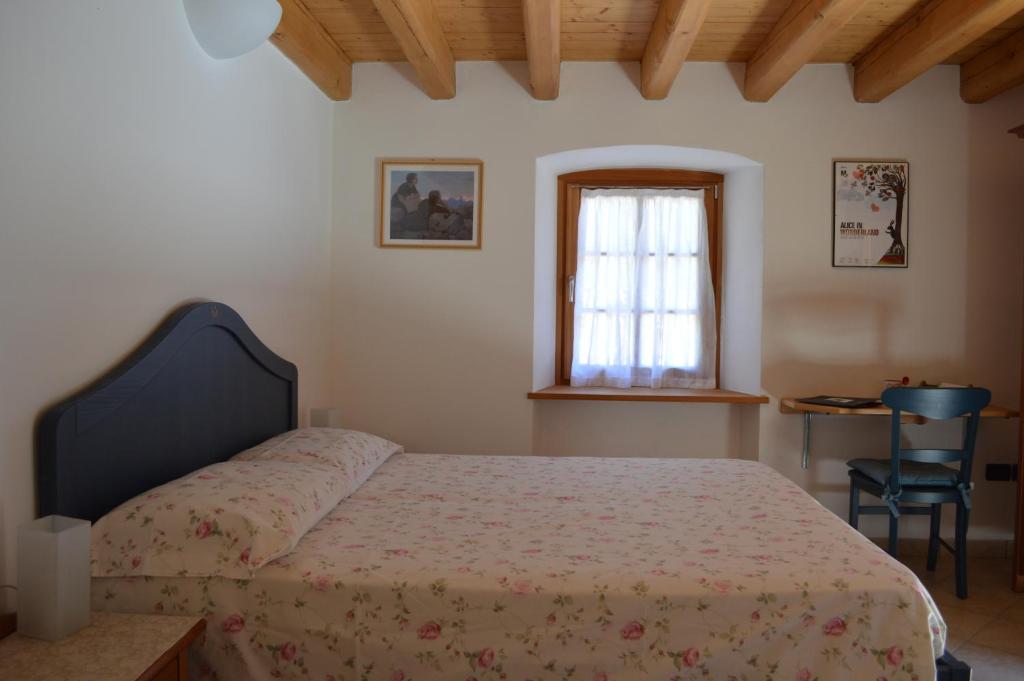 Postel nebo postele na pokoji v ubytování B&B Arlanch 8
