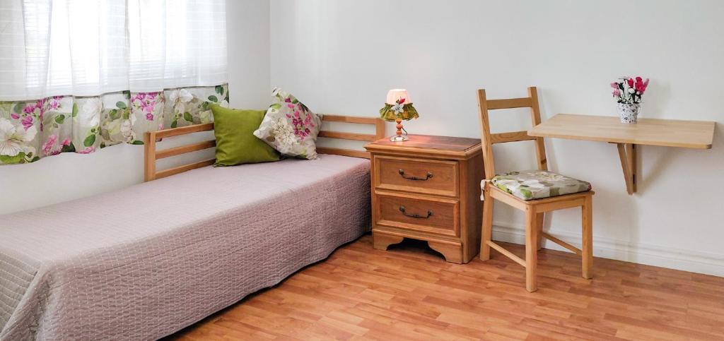Postel nebo postele na pokoji v ubytování Rainbow Guest House