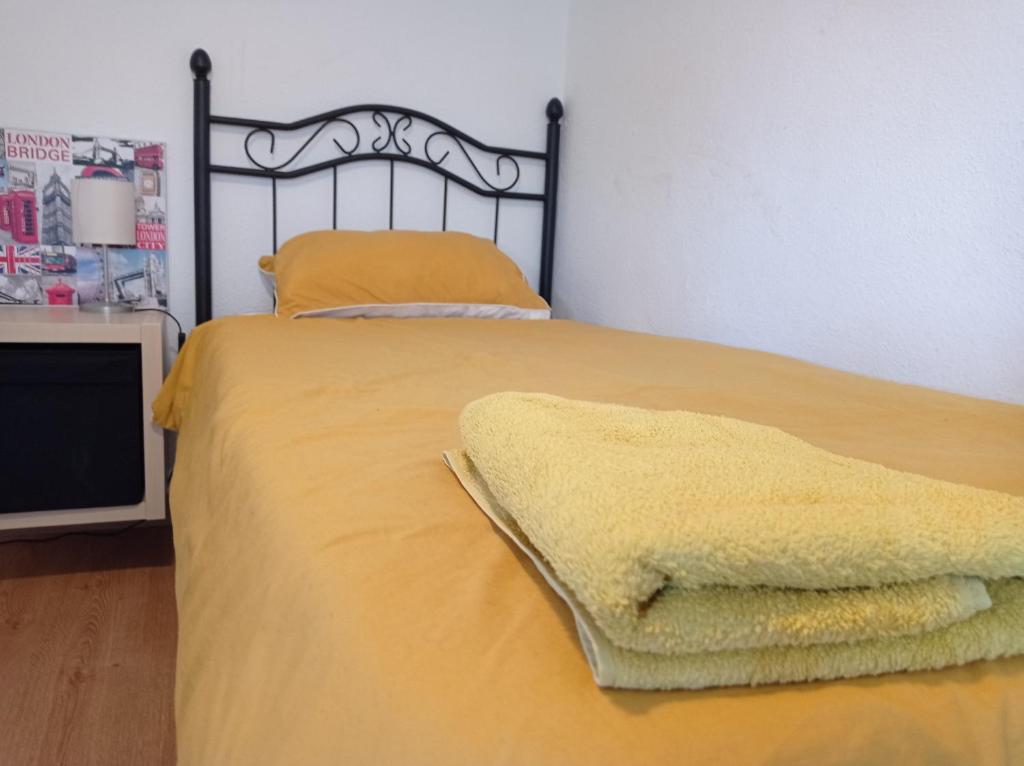 Posteľ alebo postele v izbe v ubytovaní Apartamento TISARE wifi