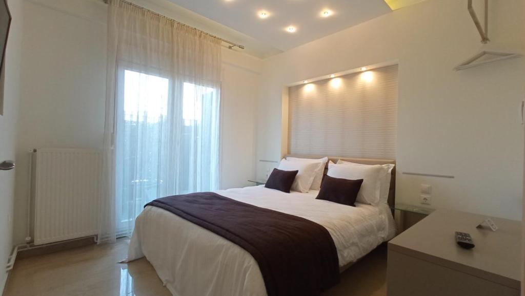 Posteľ alebo postele v izbe v ubytovaní EPaN Luxury Apartments