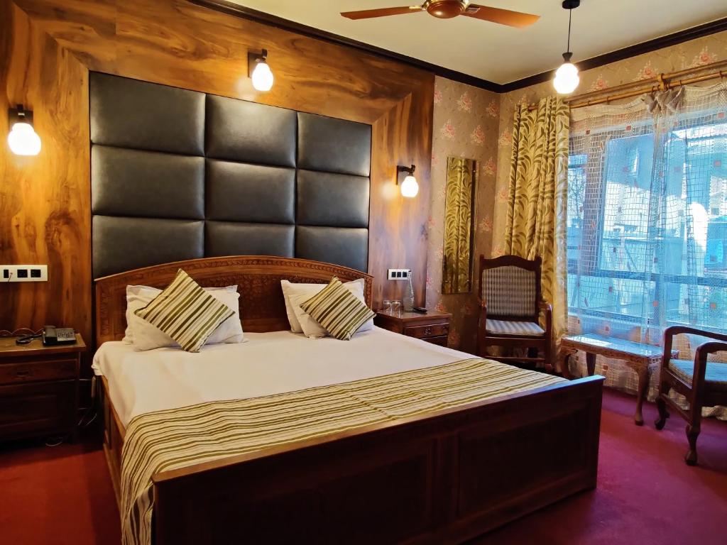 Postel nebo postele na pokoji v ubytování The Shelter Heritage A Boutique Hotel
