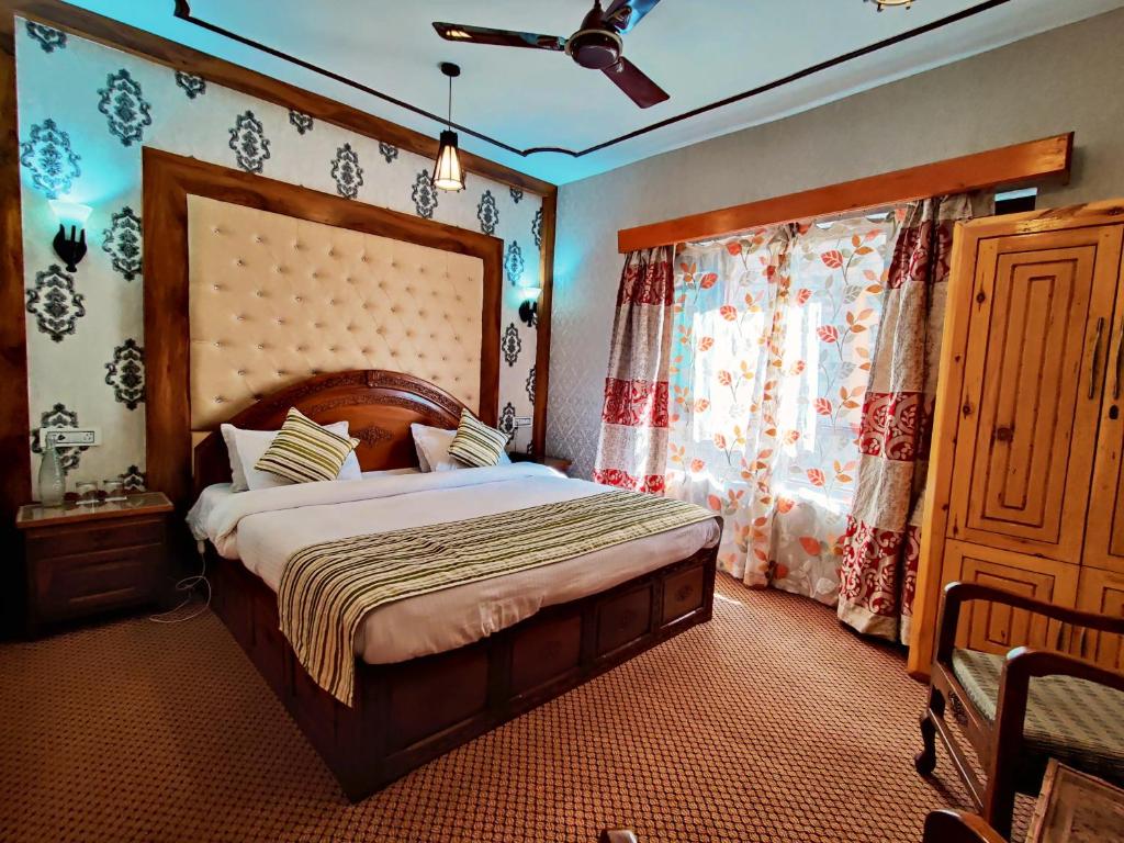 Postel nebo postele na pokoji v ubytování The Shelter Heritage A Boutique Hotel